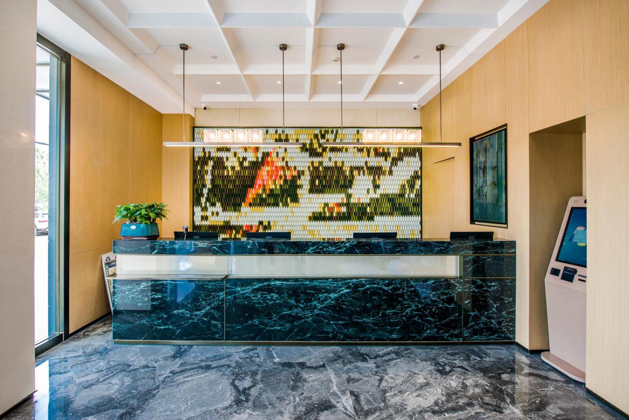 Yiwu Baide Theme Hotel Kültér fotó