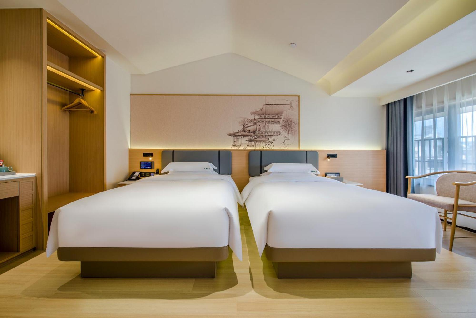 Yiwu Baide Theme Hotel Kültér fotó